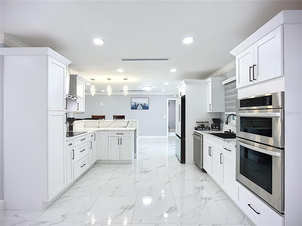Interior, Kitchen, Marble, Pendant Lights, Recessed Lighting, Stainless Steel Appliances