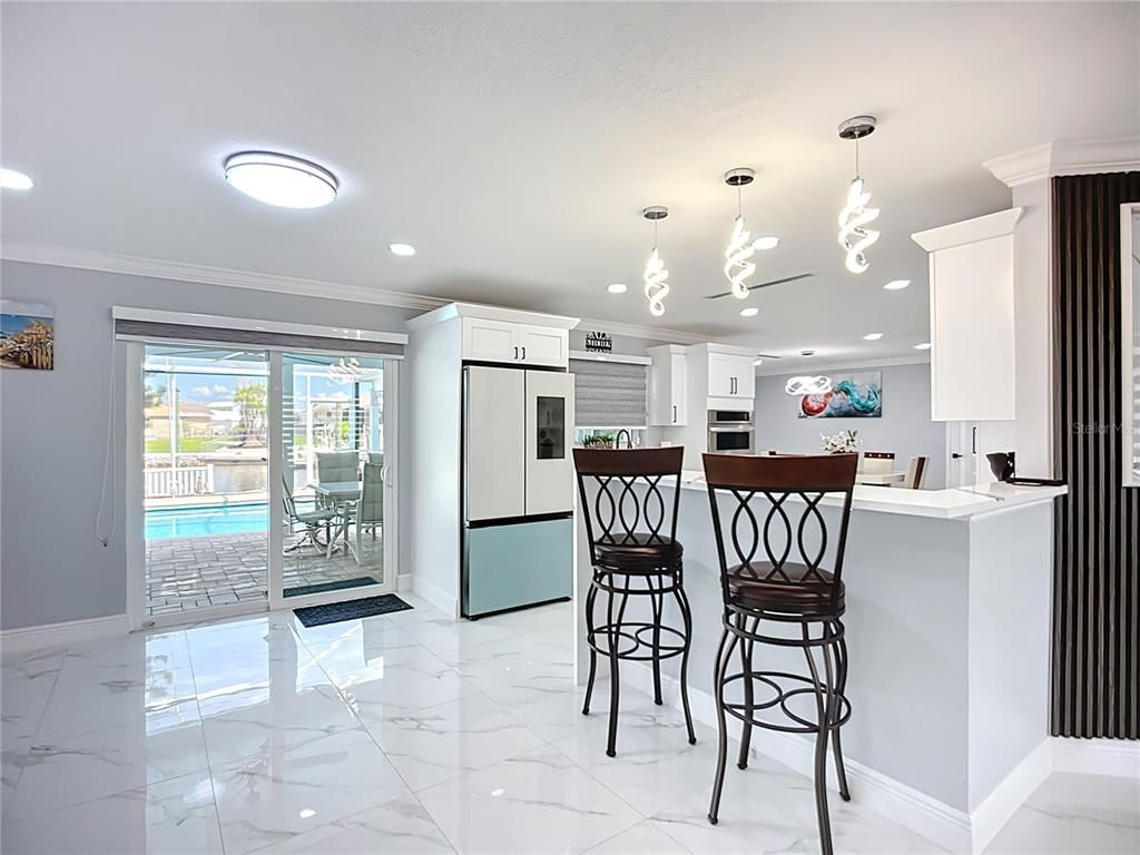 Interior, Kitchen, Marble, Pendant Lights, Recessed Lighting, Stainless Steel Appliances