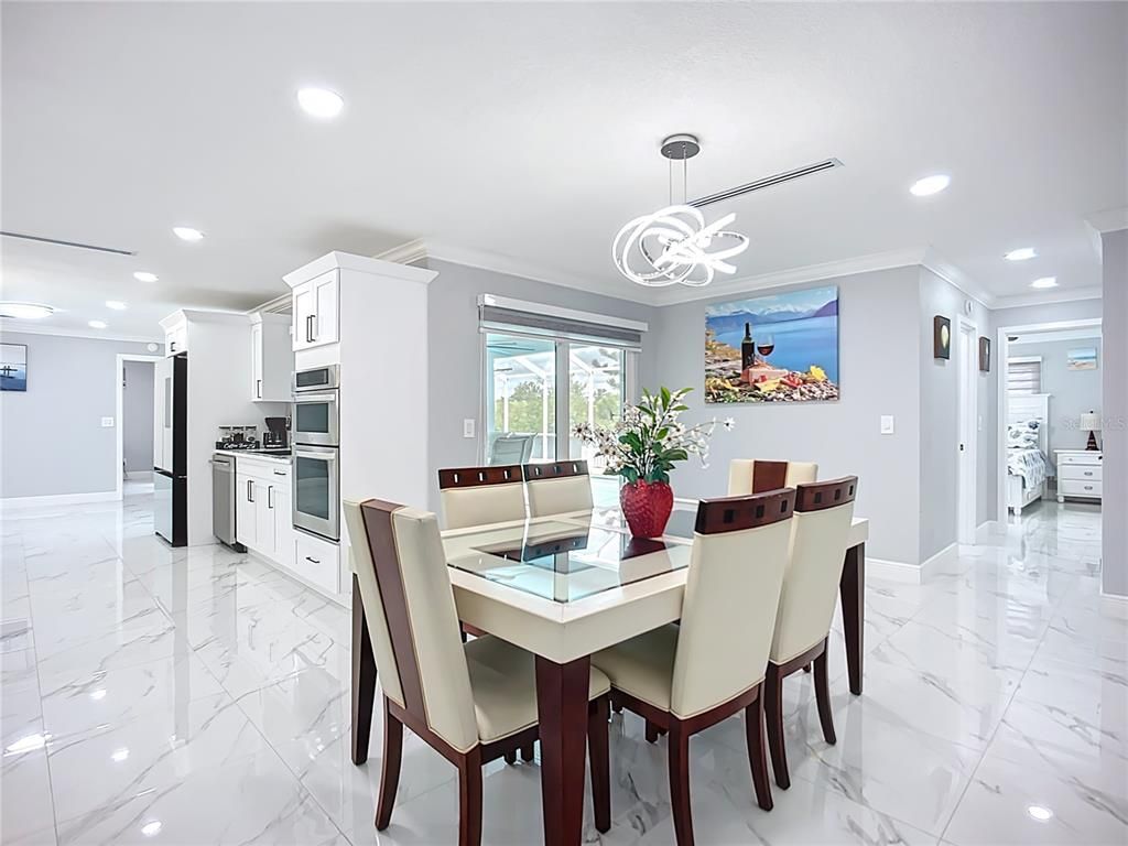 Dining room, Interior, Kitchen, Marble, Pendant Lights, Recessed Lighting, Stainless Steel Appliances