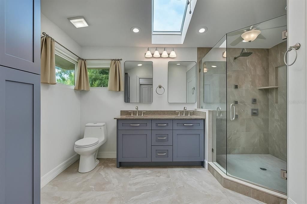 Bathroom, Dual Sink Vanities, Glass Ceilings, Glass Shower, Interior, Recessed Lighting