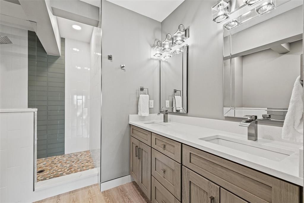 Bathroom, Dual Sink Vanities, Interior, Recessed Lighting, Wood Texture Flooring
