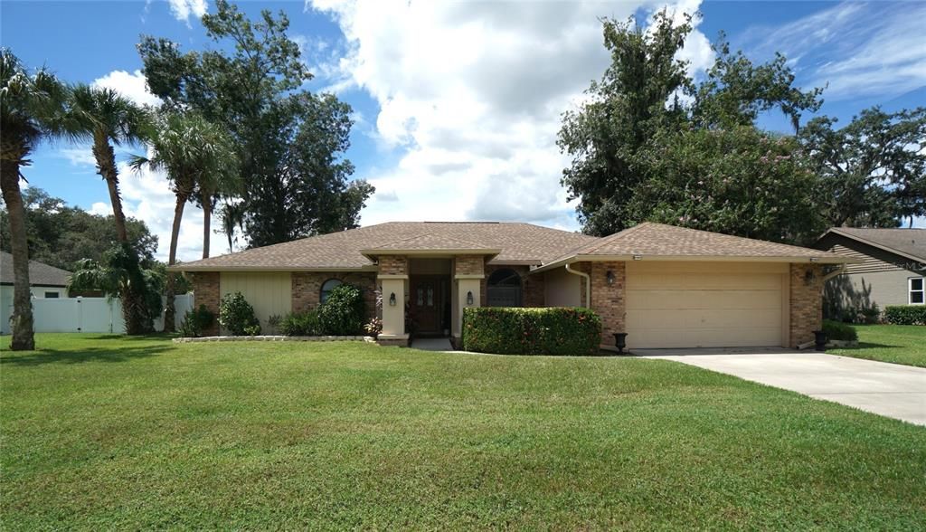 Attached, Backyard, Exterior, Facade, Brick Facade, Ranch
