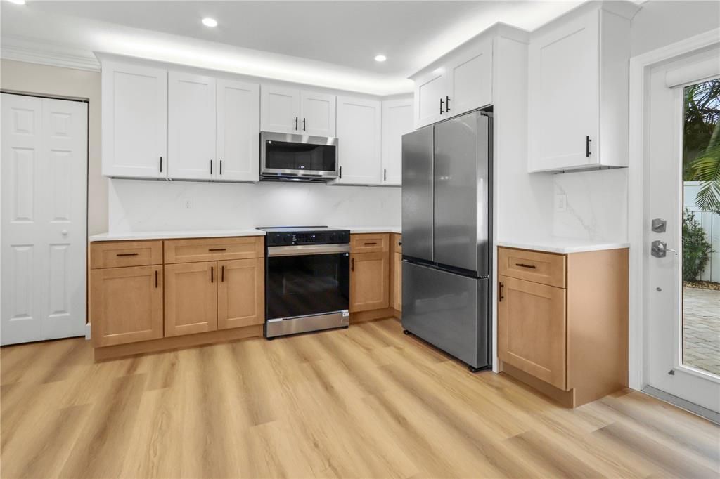 Interior, Kitchen, Recessed Lighting, Stainless Steel Appliances, Wood Texture Flooring