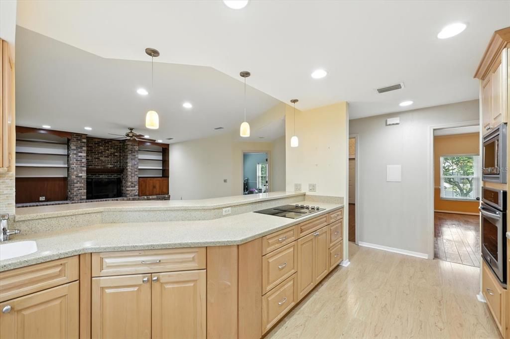 Fireplace, Interior, Kitchen, Pendant Lights, Recessed Lighting, Stone Walls, Wood Texture Flooring