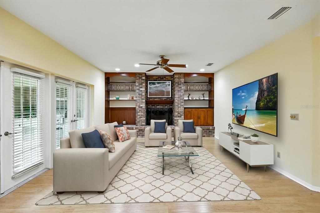 Fireplace, Interior, Living room, Recessed Lighting, Stone Walls, Wood Texture Flooring