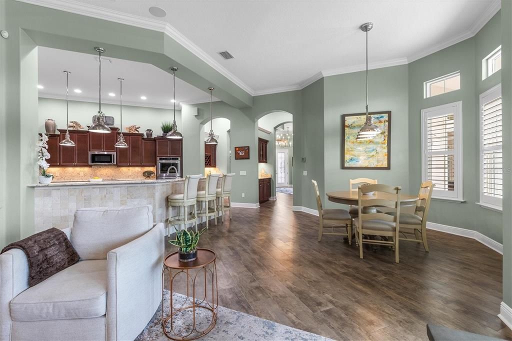 Dining room, Interior, Kitchen, Pendant Lights, Recessed Lighting, Stainless Steel Appliances, Wood Texture Flooring