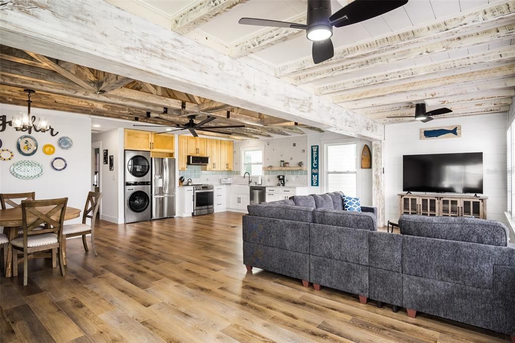 Chandelier, Dining room, Interior, Kitchen, Living room, Stainless Steel Appliances, Wooden Beams, Wooden Ceilings, Wood Texture Flooring, Wooden Walls