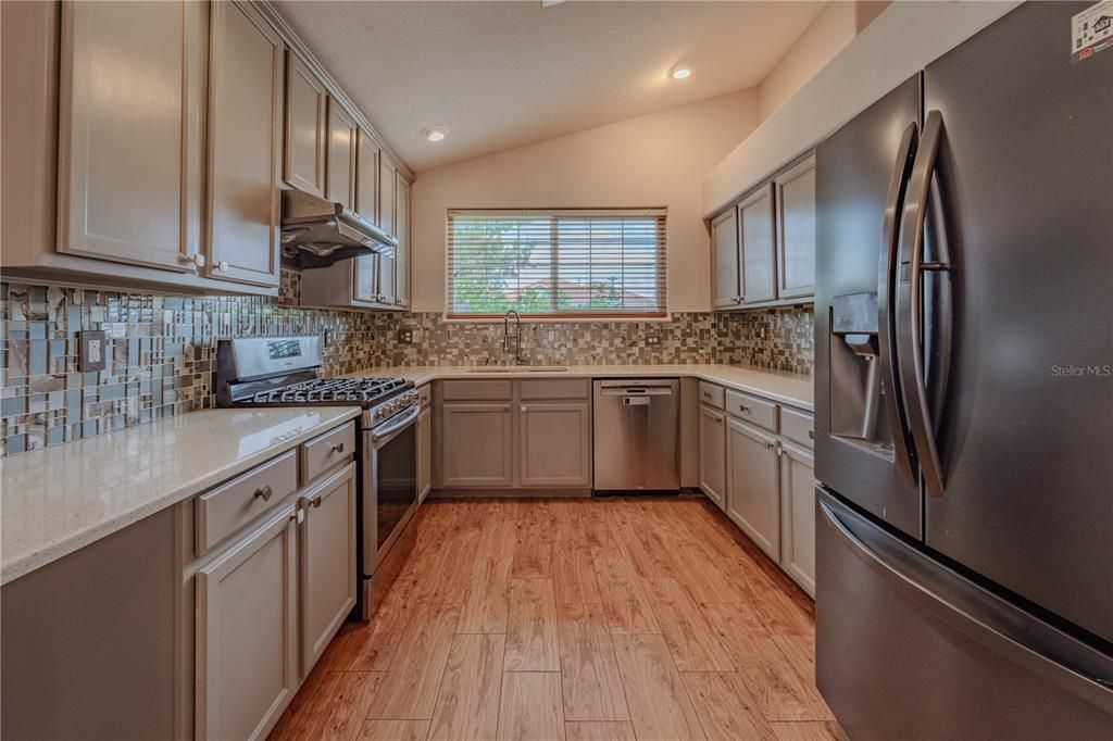Interior, Kitchen, Recessed Lighting, Stainless Steel Appliances, Wood Texture Flooring