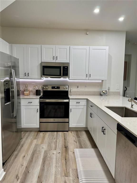Interior, Kitchen, Recessed Lighting, Stainless Steel Appliances, Wood Texture Flooring