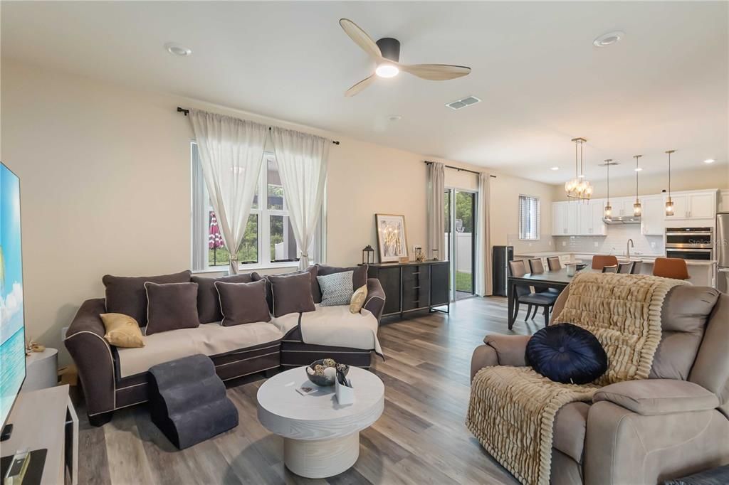 Dining room, Interior, Kitchen, Living room, Pendant Lights, Recessed Lighting, Stainless Steel Appliances, Wood Texture Flooring