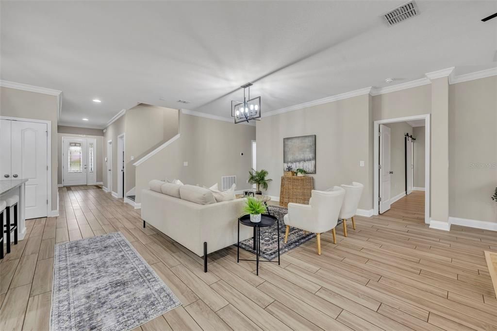 Chandelier, Dining room, Interior, Living room, Recessed Lighting, Wood Texture Flooring