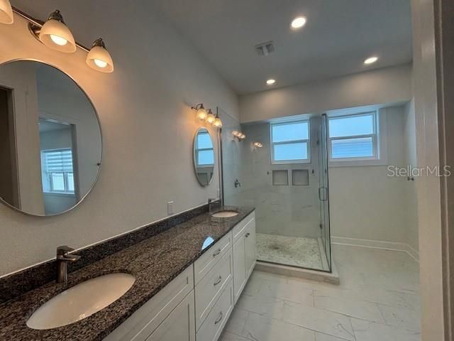 Bathroom, Dual Sink Vanities, Glass Shower, Interior, Marble, Recessed Lighting