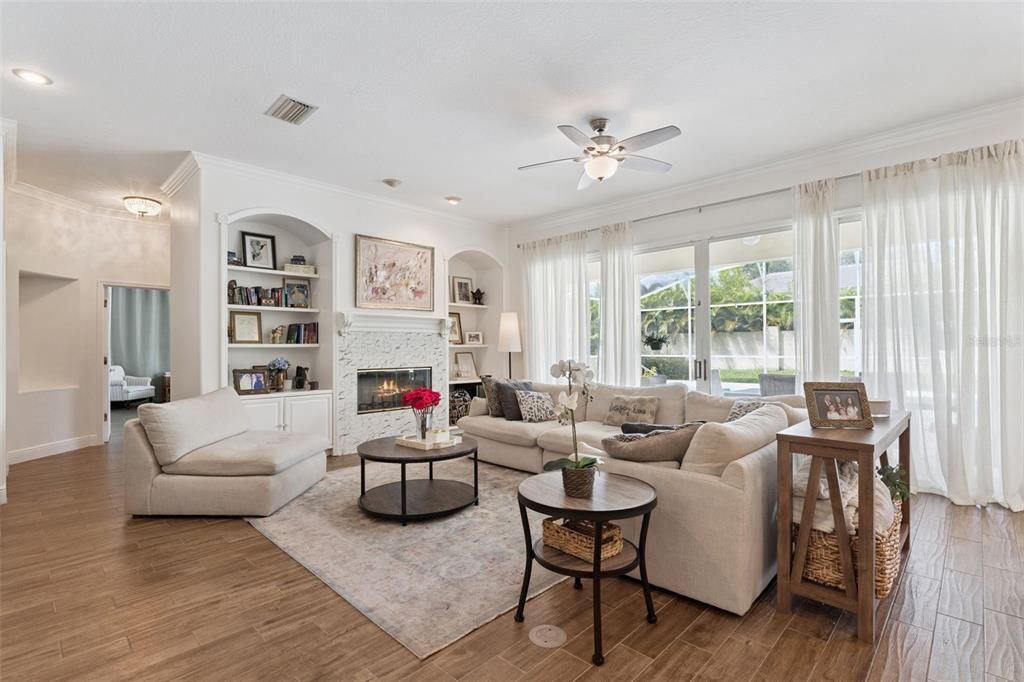 Fireplace, Interior, Living room, Recessed Lighting, Wood Texture Flooring