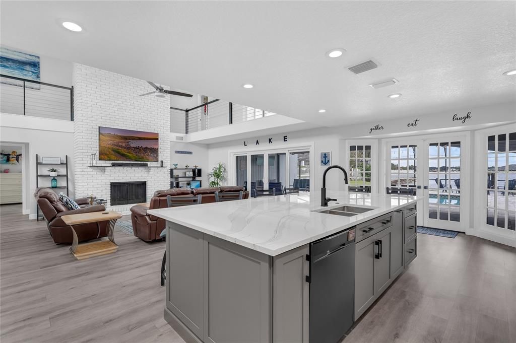 Fireplace, Interior, Kitchen, Living room, Recessed Lighting, Stone Walls, Wood Texture Flooring