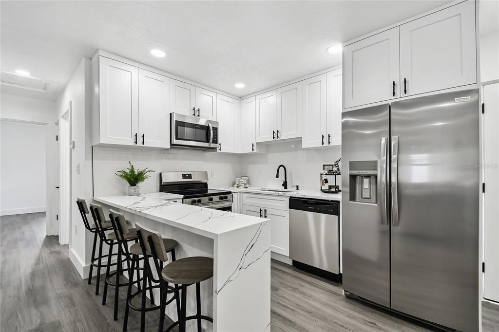 Interior, Kitchen, Recessed Lighting, Stainless Steel Appliances, Wood Texture Flooring