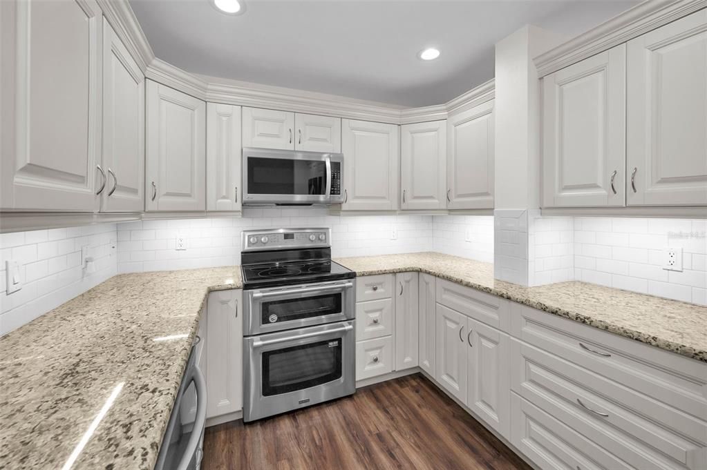 Interior, Kitchen, Recessed Lighting, Stainless Steel Appliances, Wood Texture Flooring