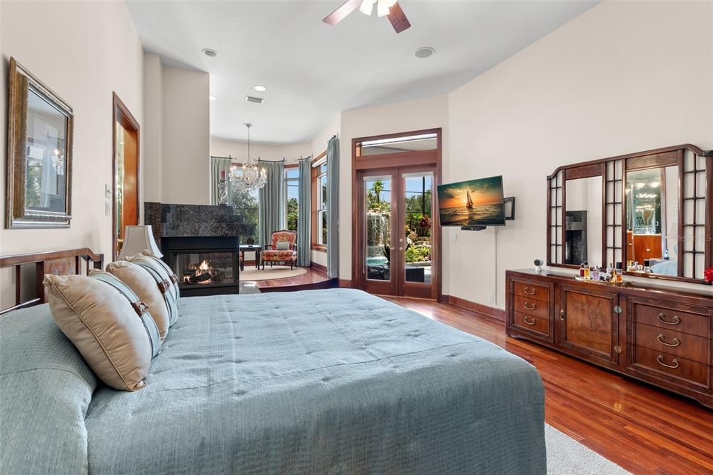 Bedroom, Chandelier, Fireplace, Interior, Recessed Lighting, Wood Texture Flooring