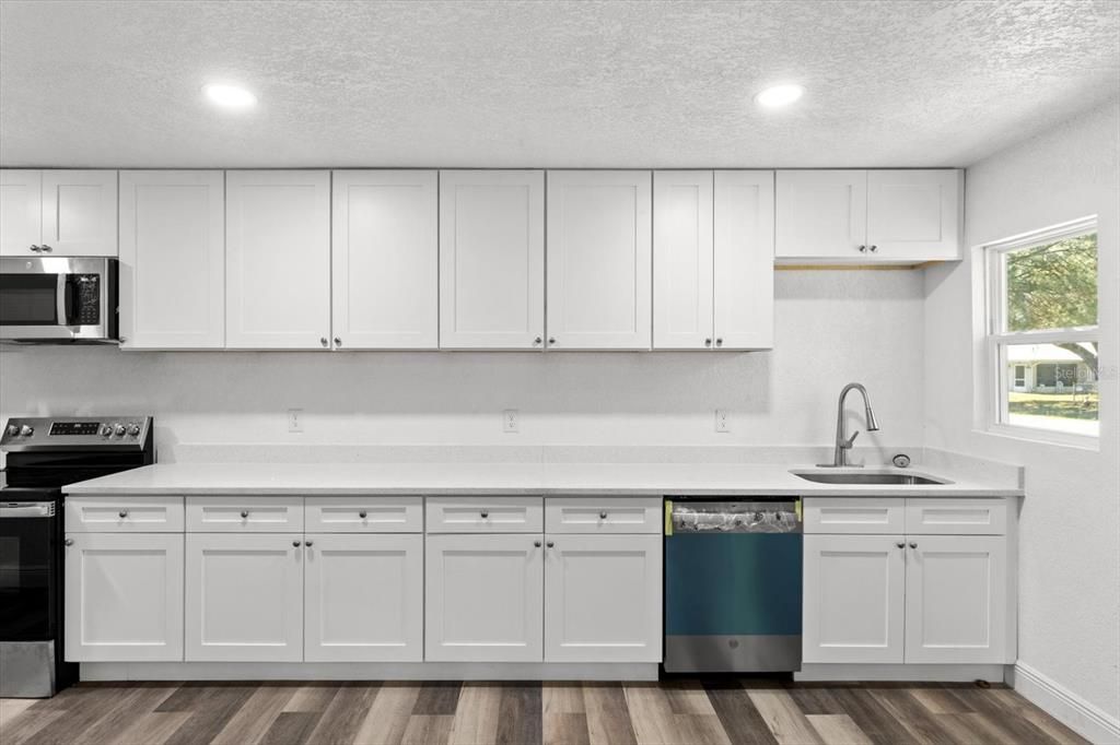 Interior, Kitchen, Recessed Lighting, Stainless Steel Appliances, Wood Texture Flooring