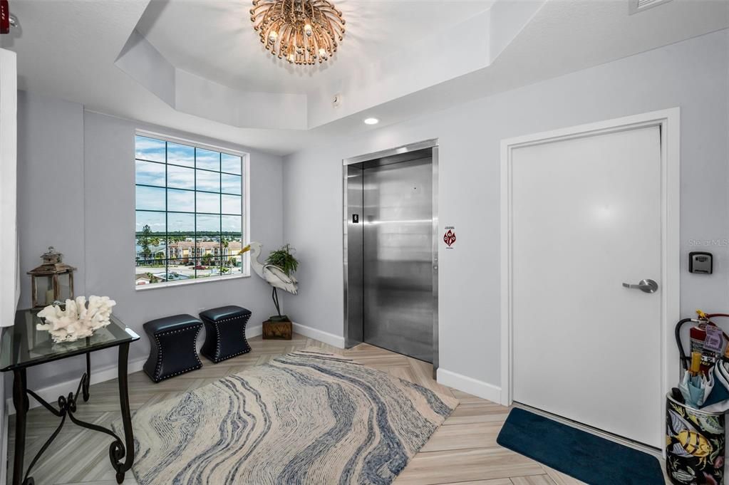 Chandelier, Elevator, Interior, Recessed Lighting, Water, Wood Texture Flooring