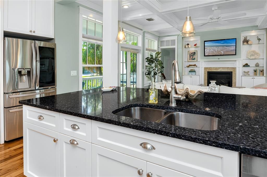 Fireplace, Interior, Kitchen, Pendant Lights, Recessed Lighting, Stainless Steel Appliances, Wood Texture Flooring