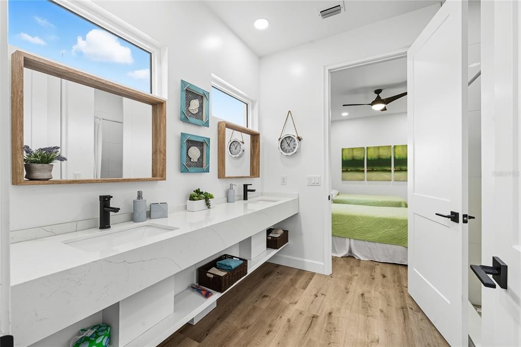 Bathroom, Dual Sink Vanities, Interior, Recessed Lighting, Wood Texture Flooring