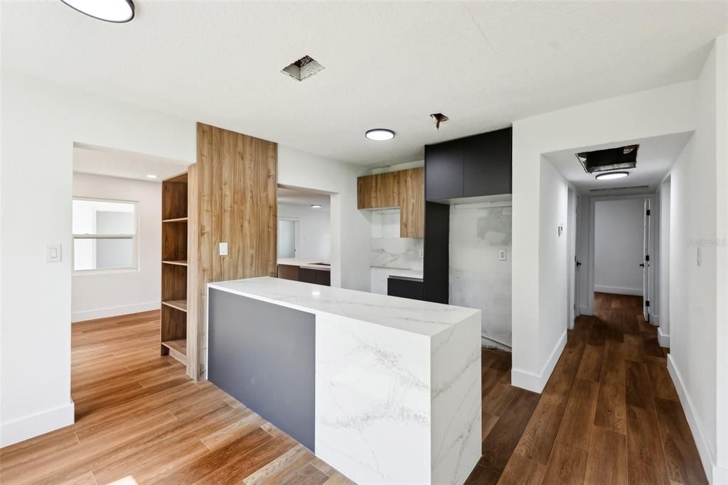 Interior, Kitchen, Marble Walls, Recessed Lighting, Wood Texture Flooring