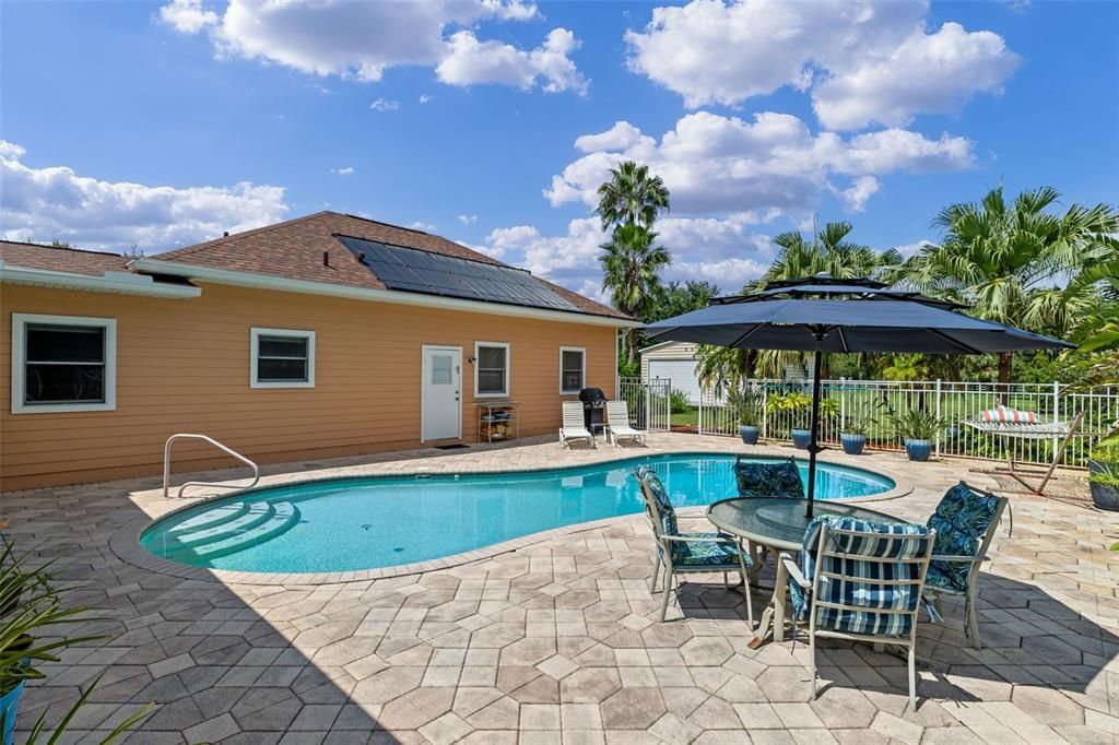 Exterior, Pool, Solar Panels