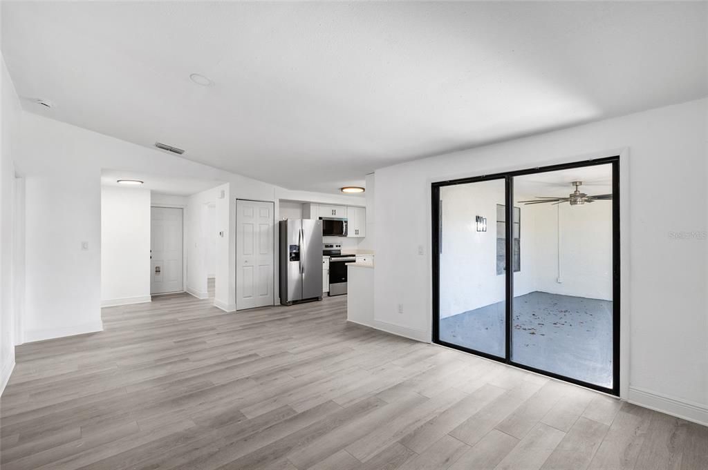 Empty room, Interior, Kitchen, Stainless Steel Appliances, Wood Texture Flooring