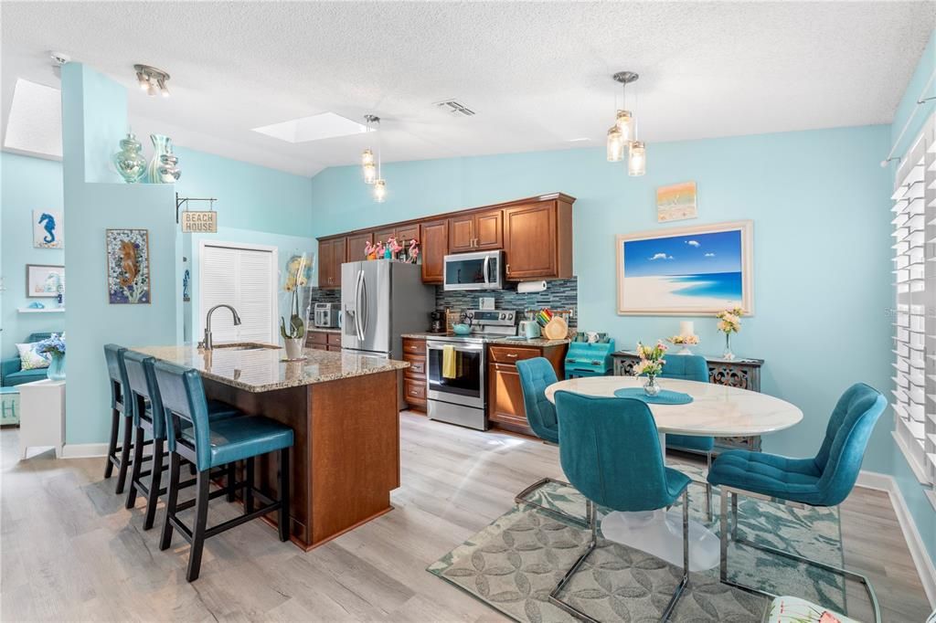 Dining room, Interior, Kitchen, Pendant Lights, Stainless Steel Appliances, Wood Texture Flooring