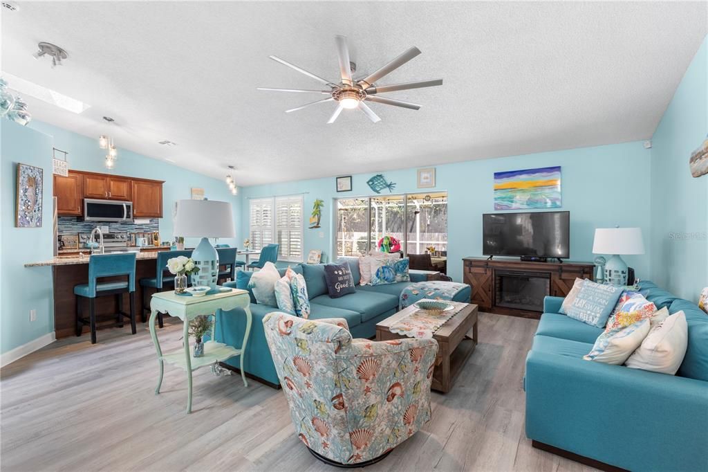 Dining room, Interior, Kitchen, Living room, Pendant Lights, Stainless Steel Appliances, Wood Texture Flooring
