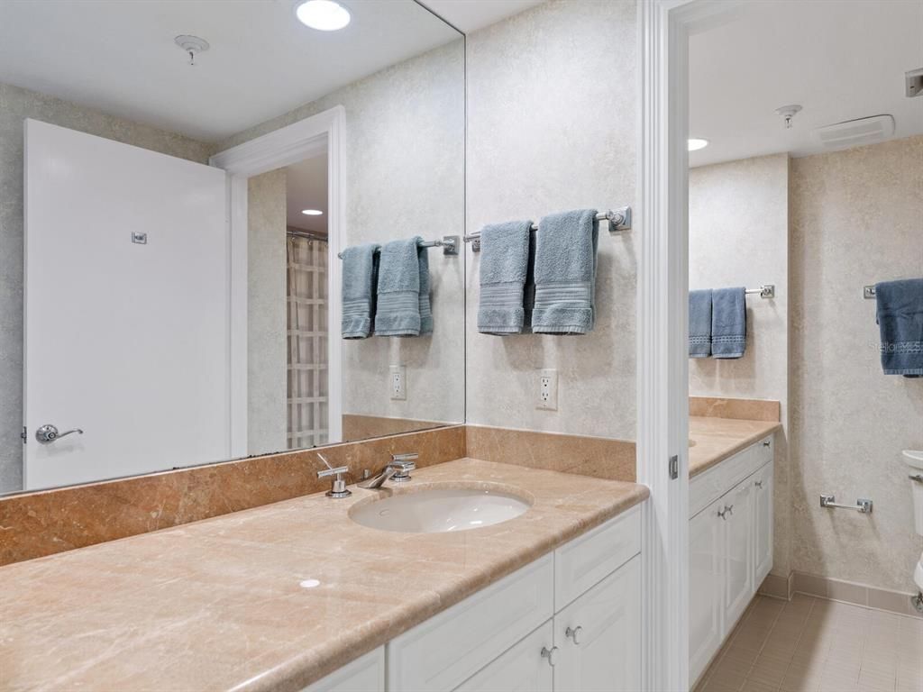Bathroom, Dual Sink Vanities, Interior, Recessed Lighting, Tile Countertops