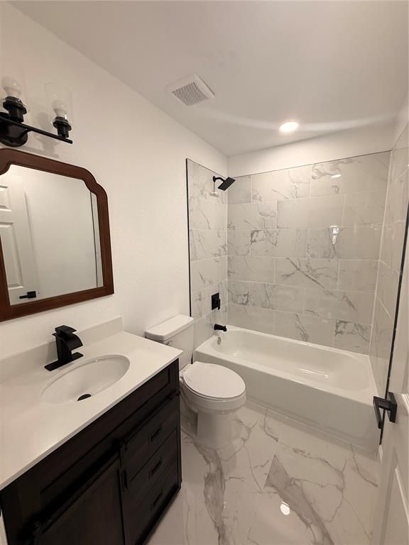 Bathroom, Dual Sink Vanities, Interior, Marble, Marble Walls, Recessed Lighting