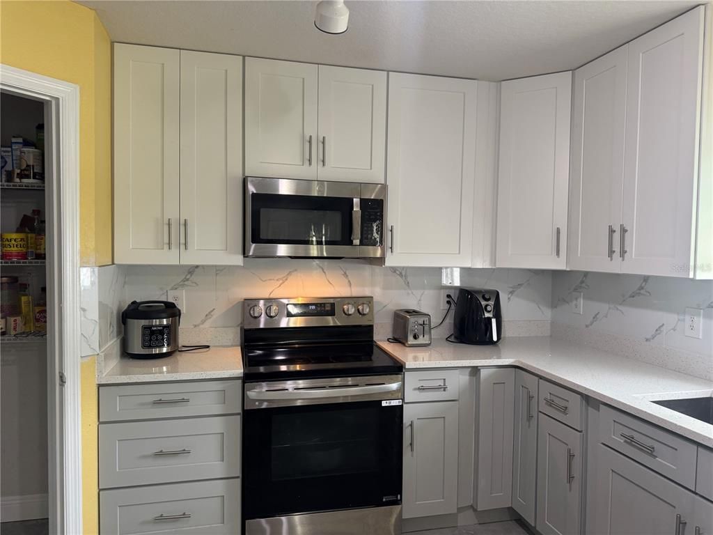 Interior, Kitchen, Marble Walls, Stainless Steel Appliances