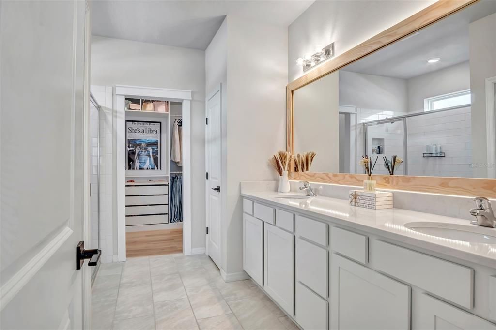 Bathroom, Dual Sink Vanities, Interior, Recessed Lighting, Walk-in Closets, Wood Texture Flooring
