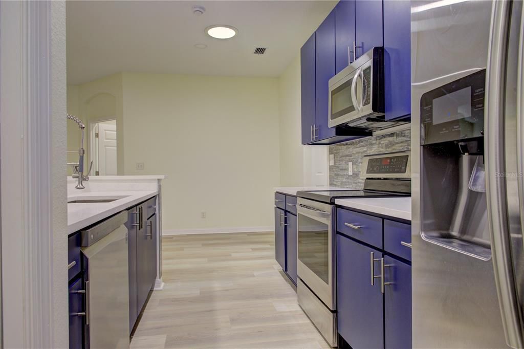 Interior, Kitchen, Recessed Lighting, Stainless Steel Appliances, Wood Texture Flooring