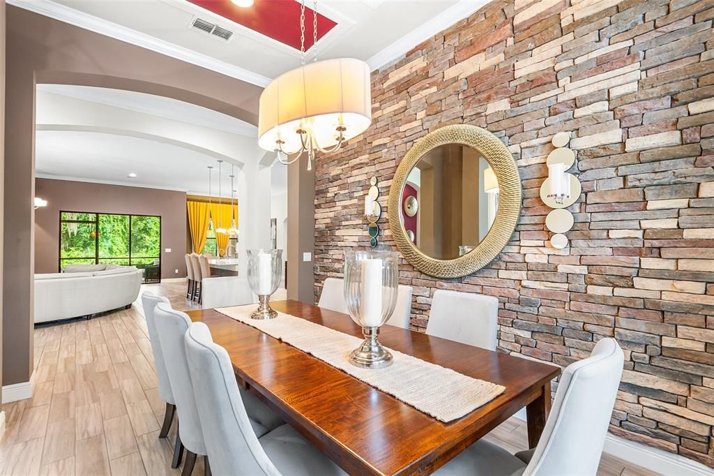 Chandelier, Dining room, Interior, Pendant Lights, Recessed Lighting, Stone Walls, Wood Texture Flooring