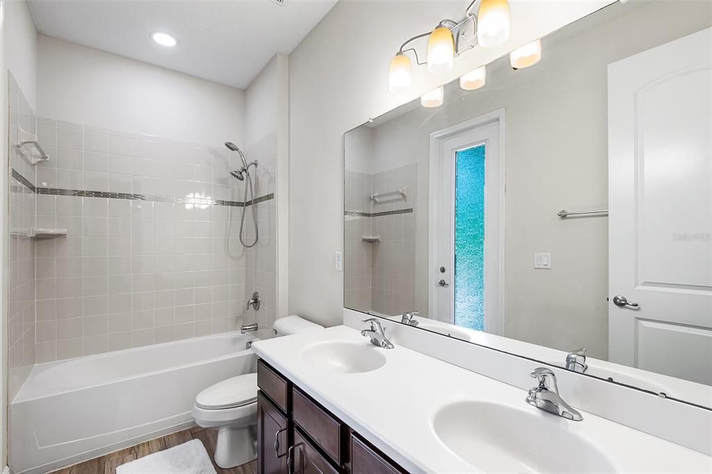 Bathroom, Dual Sink Vanities, Interior, Recessed Lighting, Wood Texture Flooring