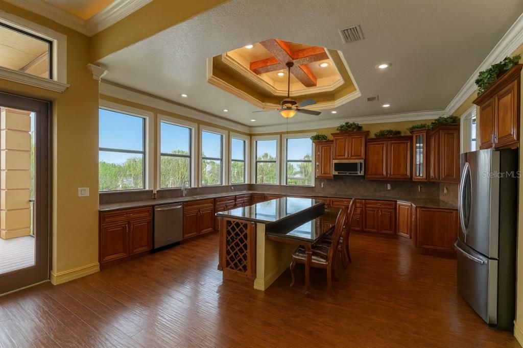Dining room, Interior, Kitchen, Recessed Lighting, Stainless Steel Appliances, Wood Texture Flooring