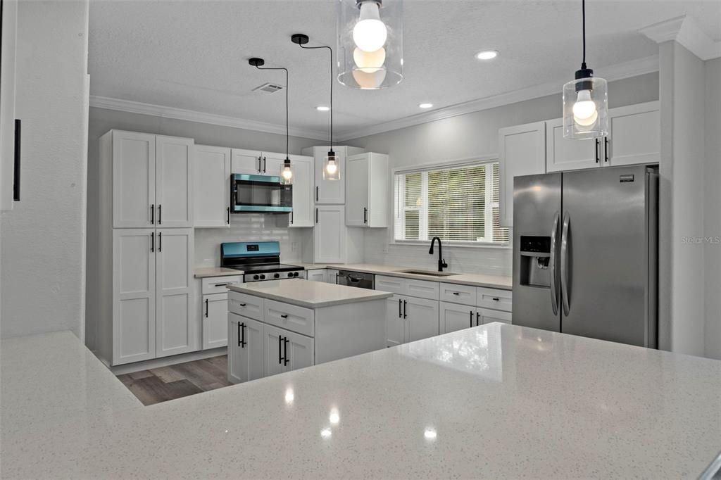 Interior, Kitchen, Pendant Lights, Recessed Lighting, Stainless Steel Appliances, Wood Texture Flooring