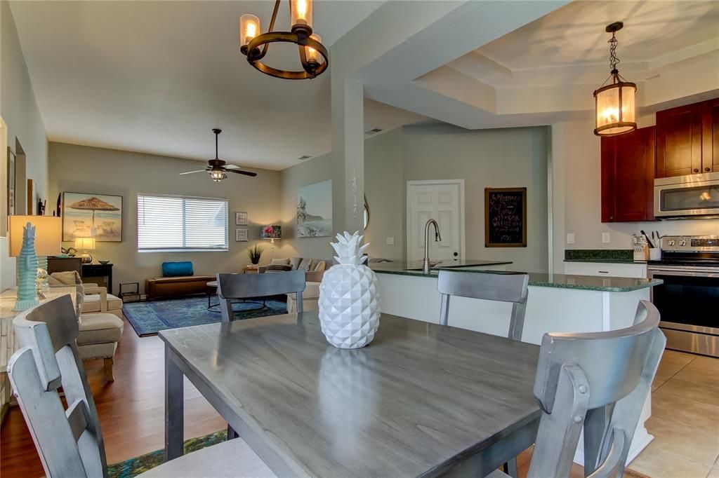 Dining room, Interior, Kitchen, Living room, Pendant Lights, Stainless Steel Appliances, Wood Texture Flooring