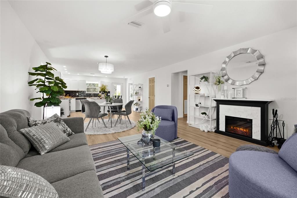 Chandelier, Dining room, Fireplace, Interior, Kitchen, Living room, Pendant Lights, Wood Texture Flooring