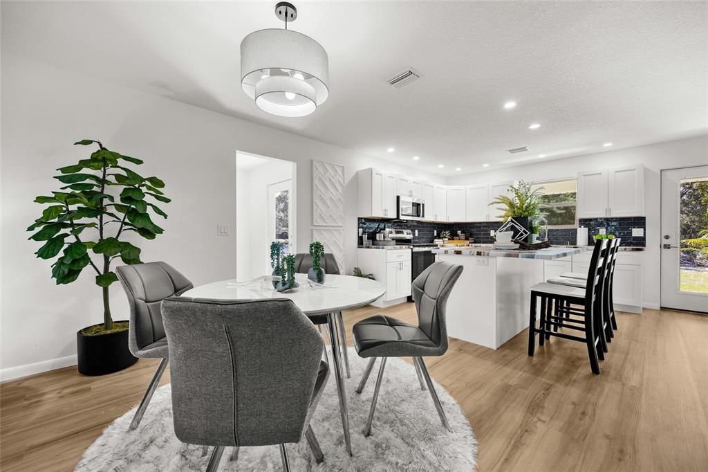 Dining room, Interior, Kitchen, Recessed Lighting, Stainless Steel Appliances, Wood Texture Flooring
