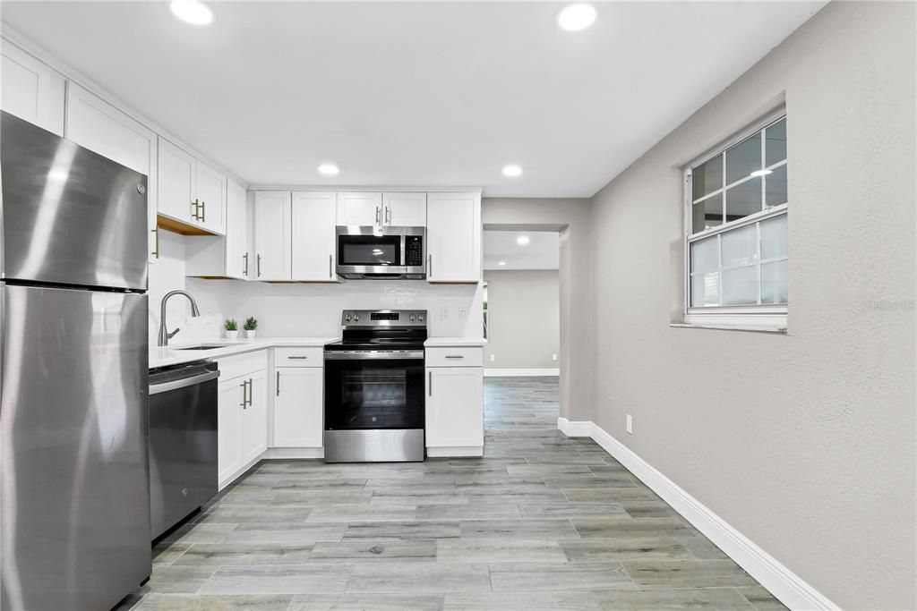 Interior, Kitchen, Recessed Lighting, Stainless Steel Appliances, Wood Texture Flooring