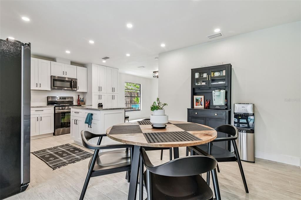 Dining room, Interior, Kitchen, Recessed Lighting, Stainless Steel Appliances, Wood Texture Flooring