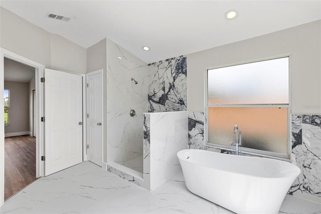Bathroom, Free Standing Baths, Interior, Marble, Marble Walls, Recessed Lighting