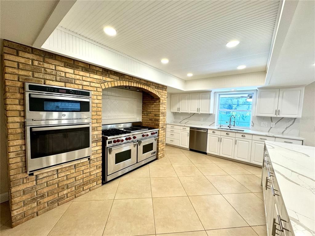 Interior, Kitchen, Recessed Lighting, Stainless Steel Appliances, Stone Walls