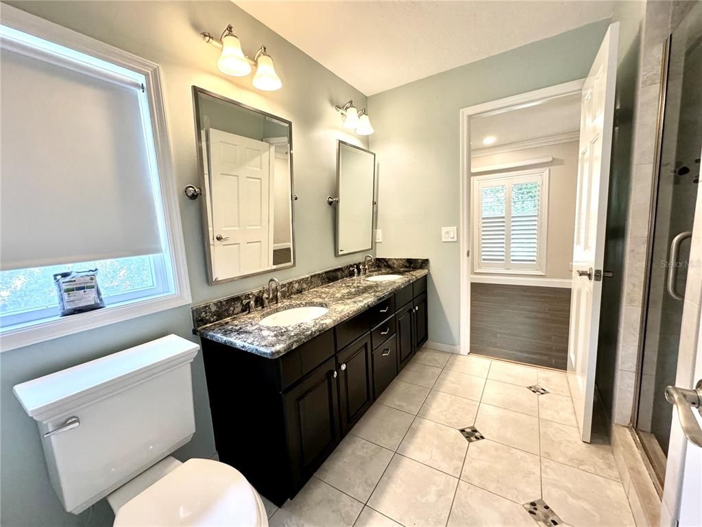 Bathroom, Dual Sink Vanities, Glass Shower, Interior, Wood Texture Flooring