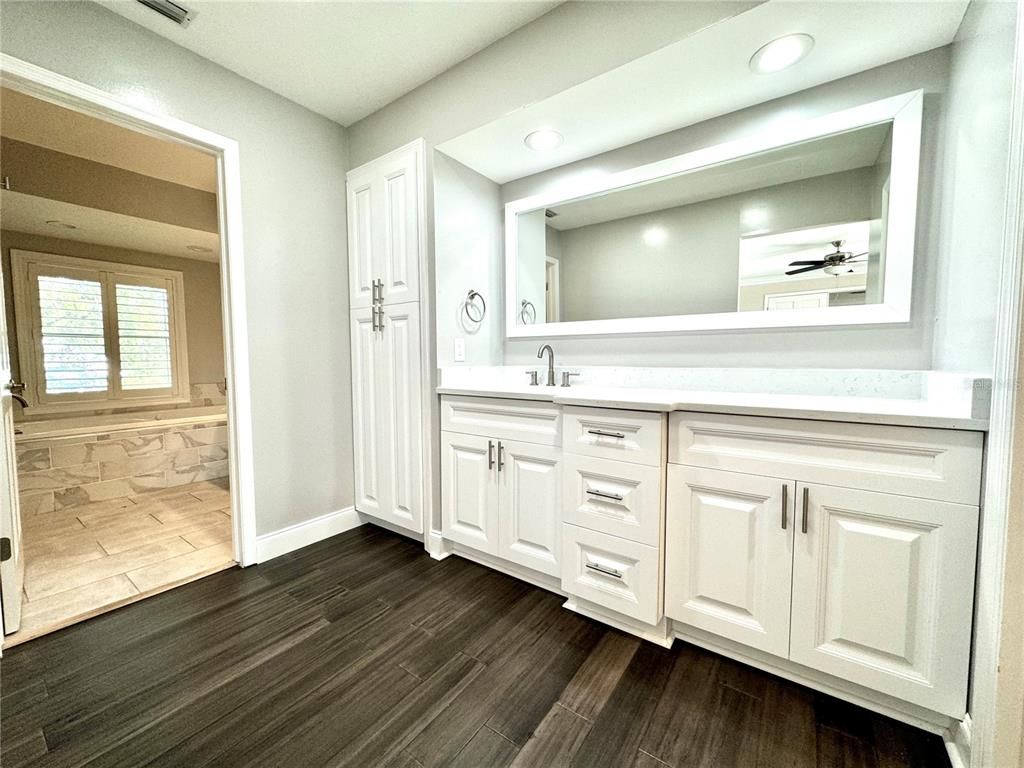 Bathroom, Dual Sink Vanities, Interior, Recessed Lighting, Wood Texture Flooring