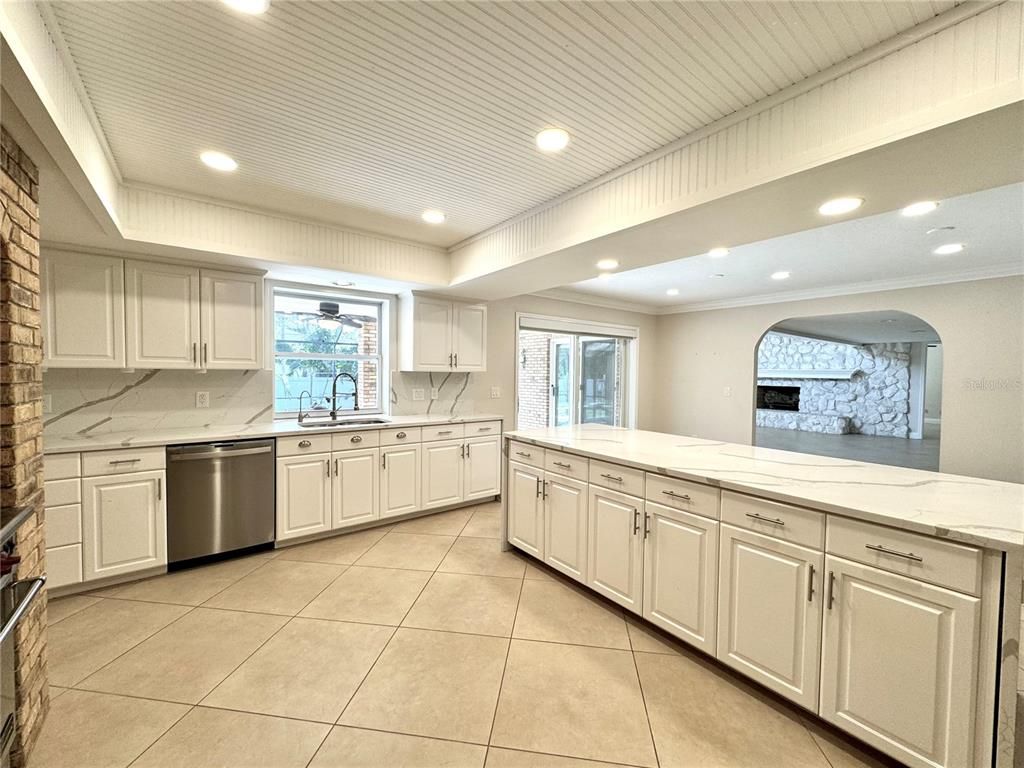 Interior, Kitchen, Marble Walls, Recessed Lighting, Stainless Steel Appliances