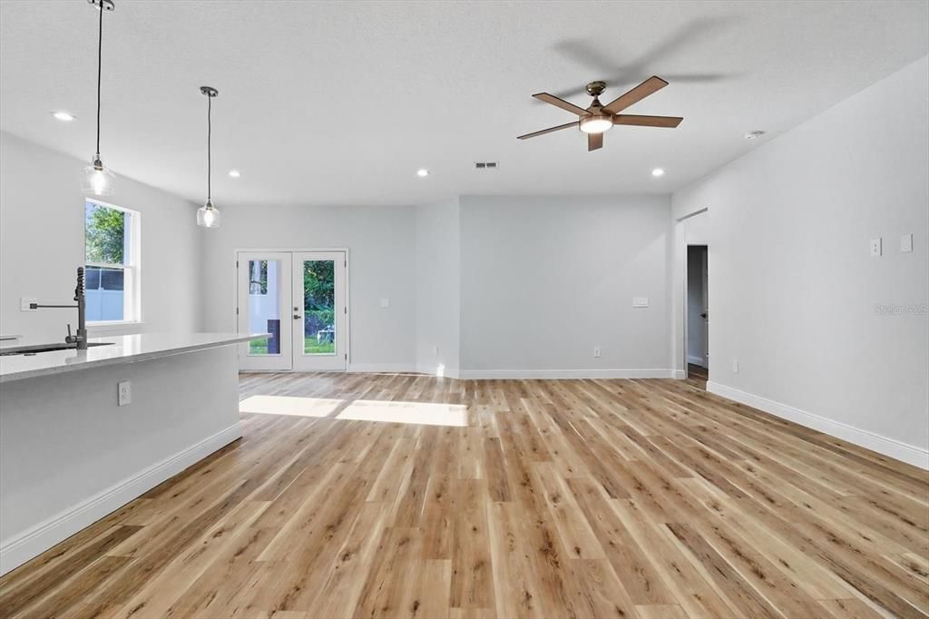 Empty room, Interior, Kitchen, Pendant Lights, Recessed Lighting, Wood Texture Flooring